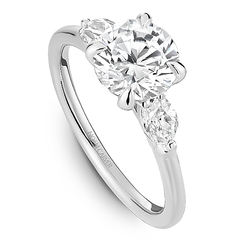 Three-stone diamond ring with oval accents.