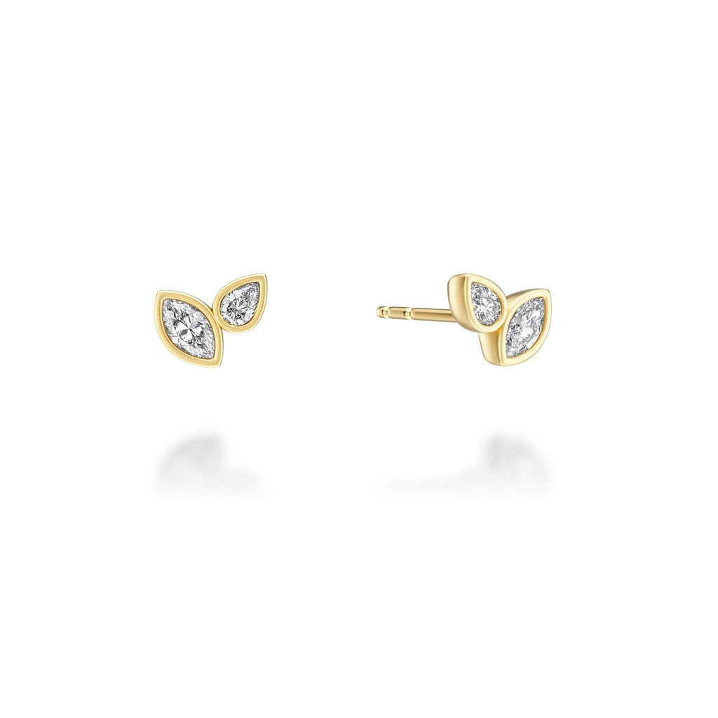 Marquise diamond earrings in yellow gold.