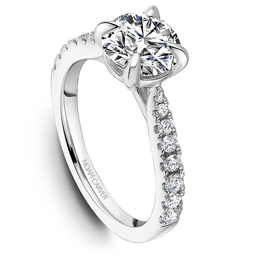 Platinum ring with round diamond accents.