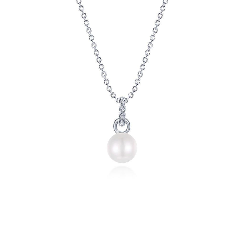 Freshwater pearl pendant with simulated diamonds.