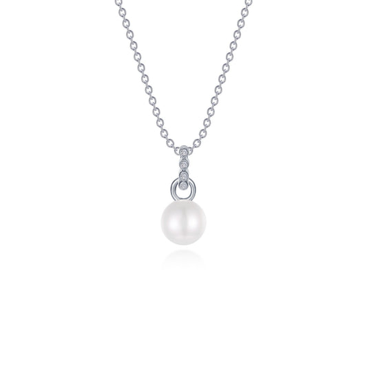 Freshwater pearl pendant with simulated diamonds.
