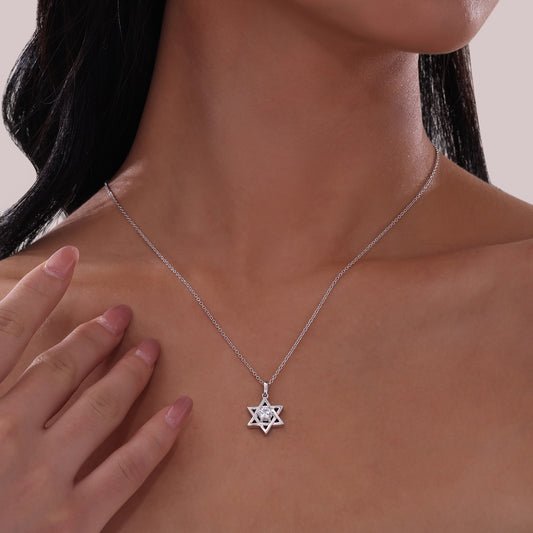 Star of David necklace with simulated diamond.