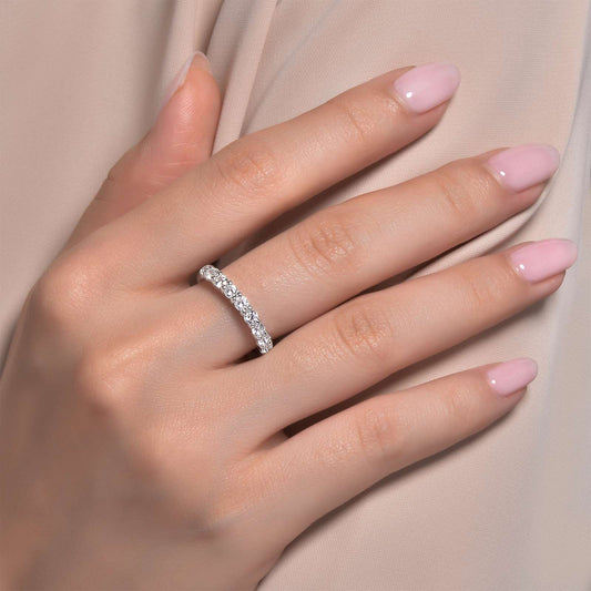 Simulated diamond band on hand.