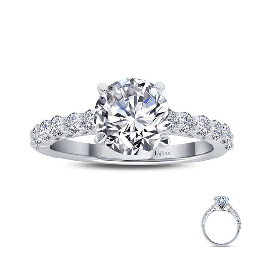 Platinum ring with round simulated diamonds.