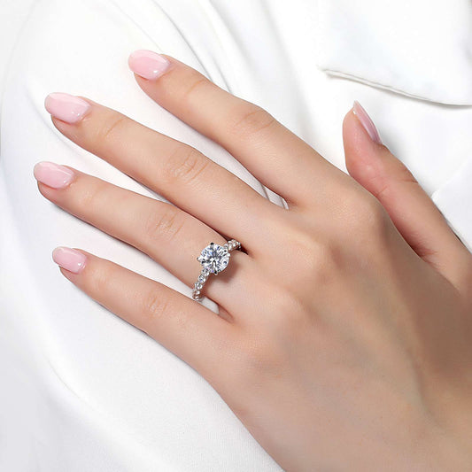 Simulated diamond ring on hand.