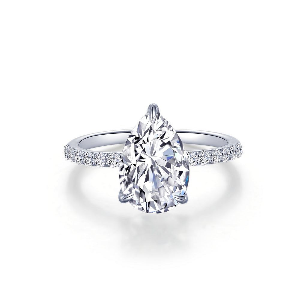 Pear-shaped diamond ring, platinum-bonded silver band.