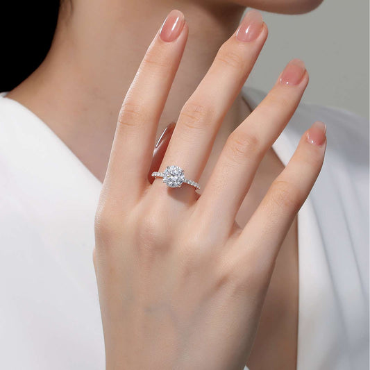 Simulated diamond ring on hand.