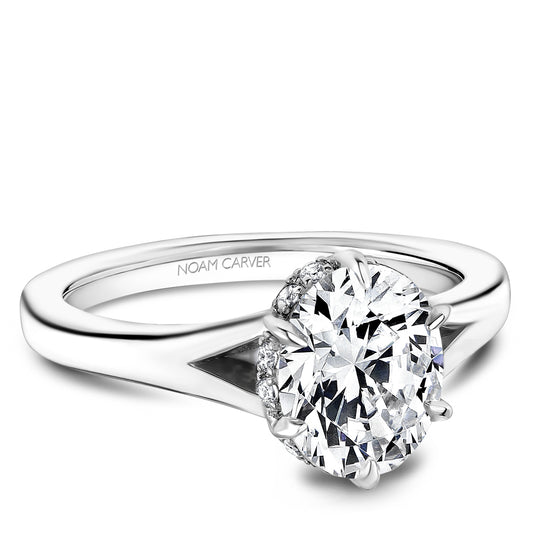 Solitaire diamond ring, 14K white gold, prong setting.