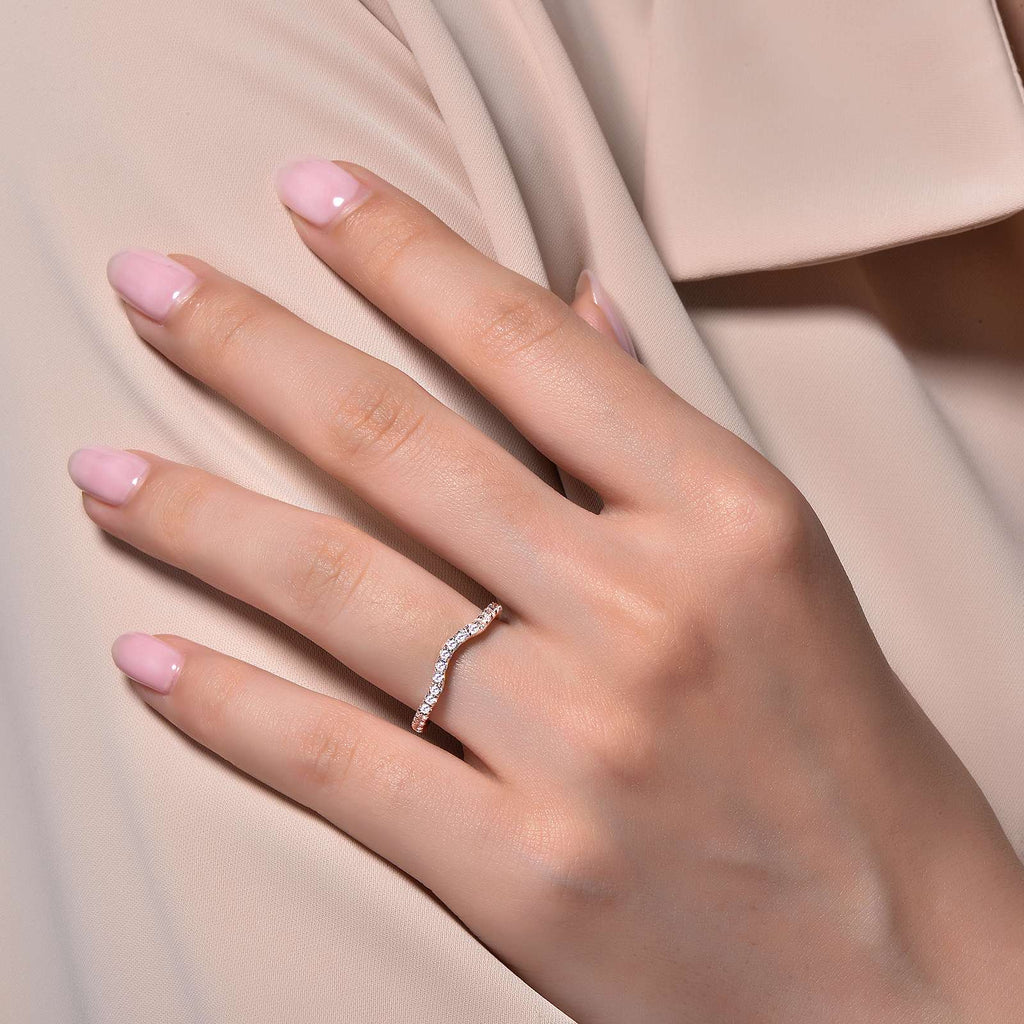 Simulated diamond ring on hand.