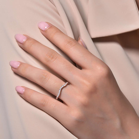Simulated diamond ring on hand.