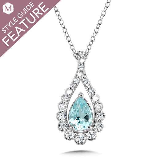 Pear aquamarine pendant with diamond accents.