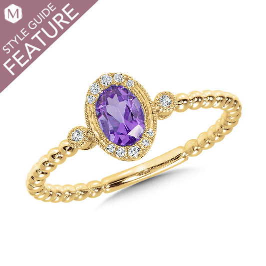 Oval amethyst ring with diamond accents.