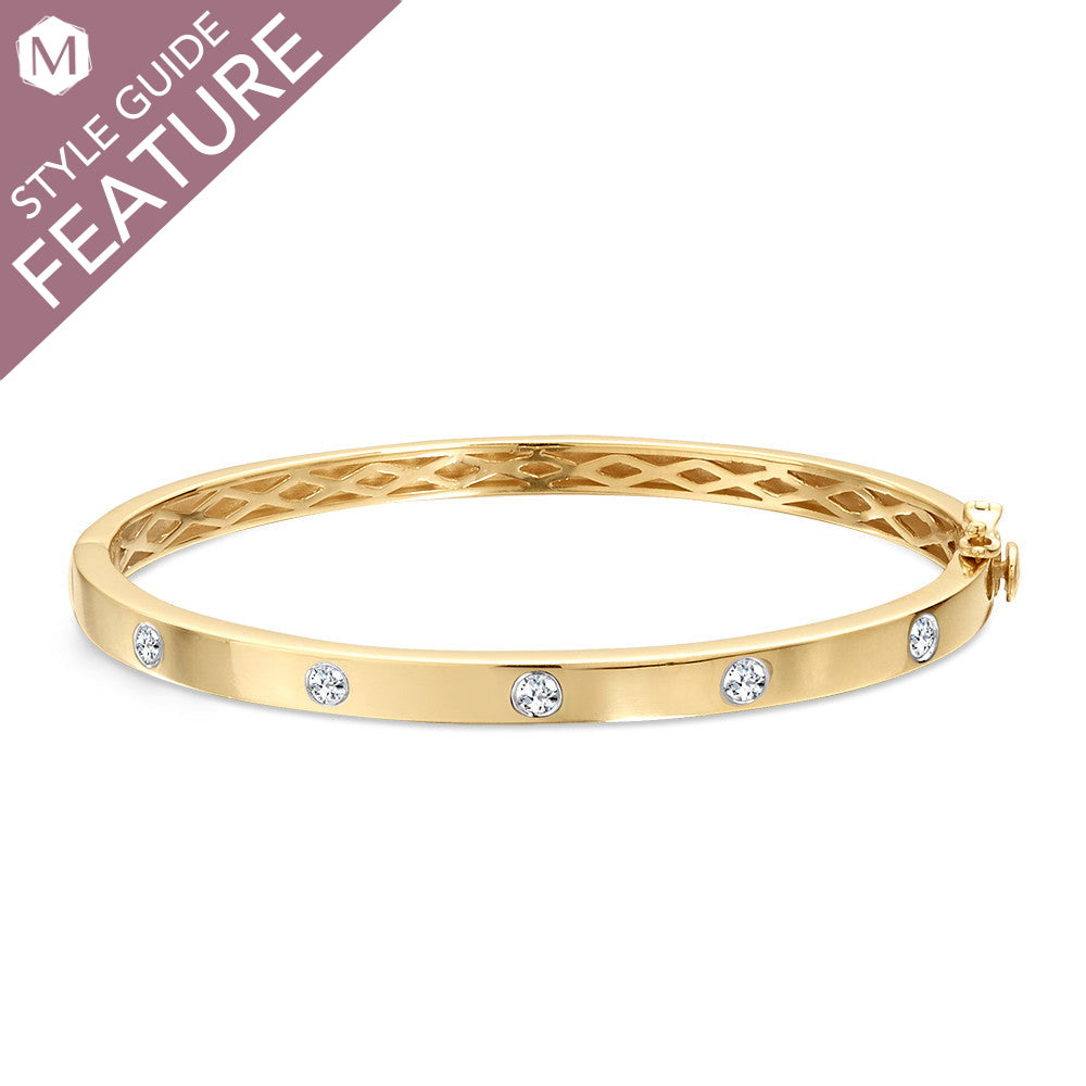 14K yellow gold bracelet with round diamonds.