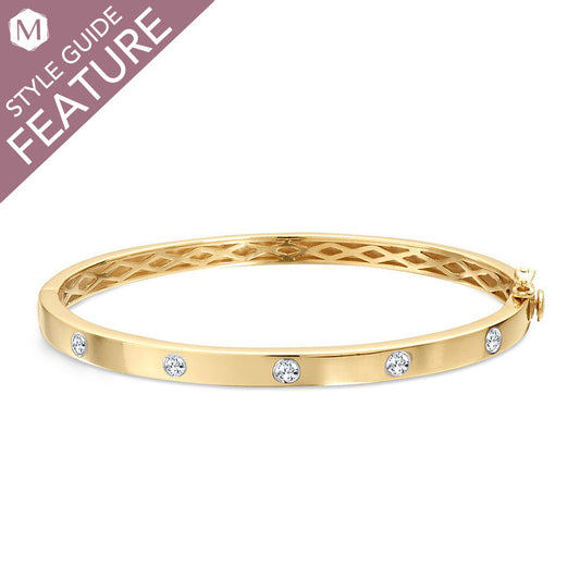 14K yellow gold bracelet with round diamonds.