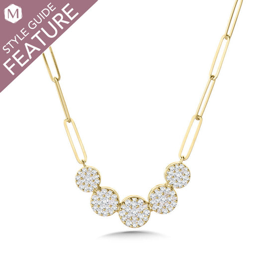 Yellow gold necklace with round diamond clusters.