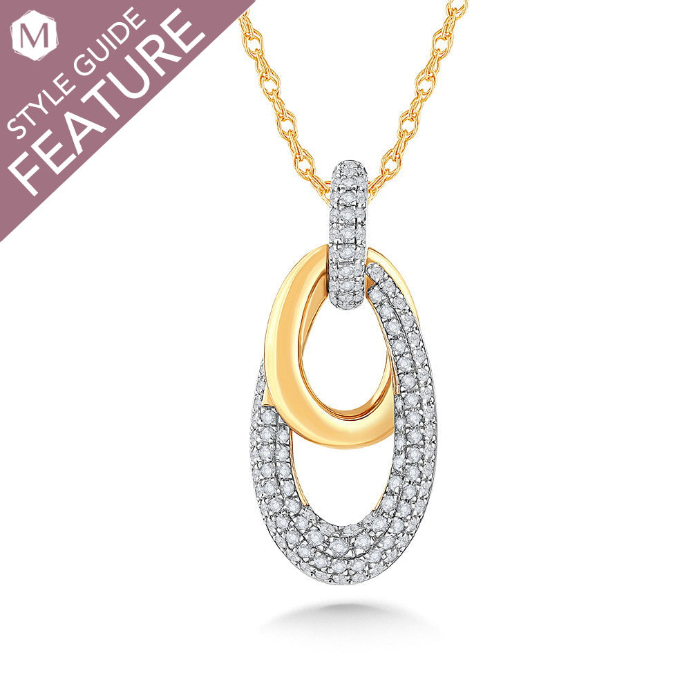 Diamond and gold oval pendant necklace.
