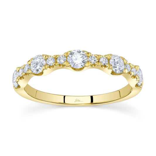 Yellow gold band with round diamonds.