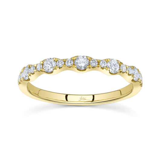 Yellow gold band with round diamonds.