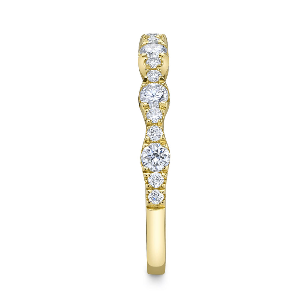 Yellow gold band with round diamonds.