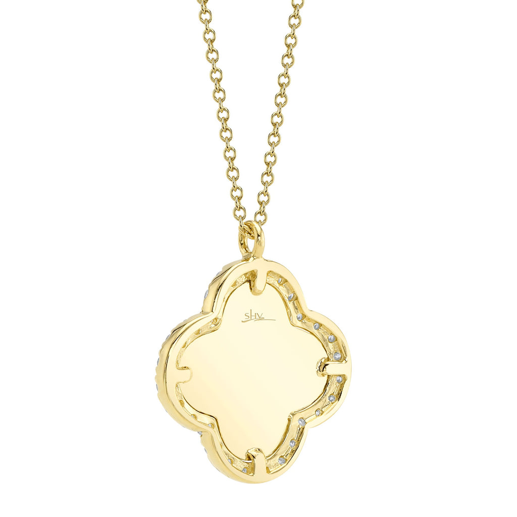Clover-shaped yellow gold diamond necklace.
