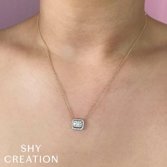 Diamond necklace with square pendant design.