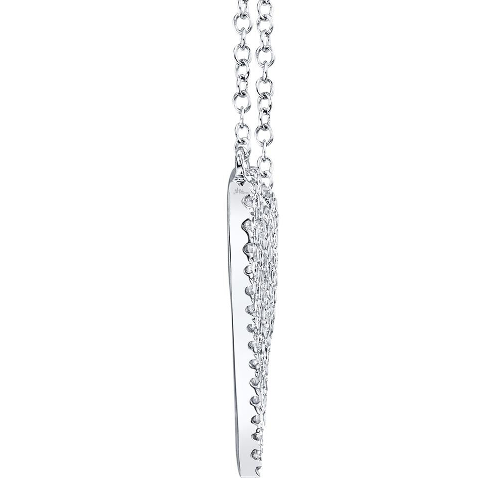Side view of diamond pendant necklace.