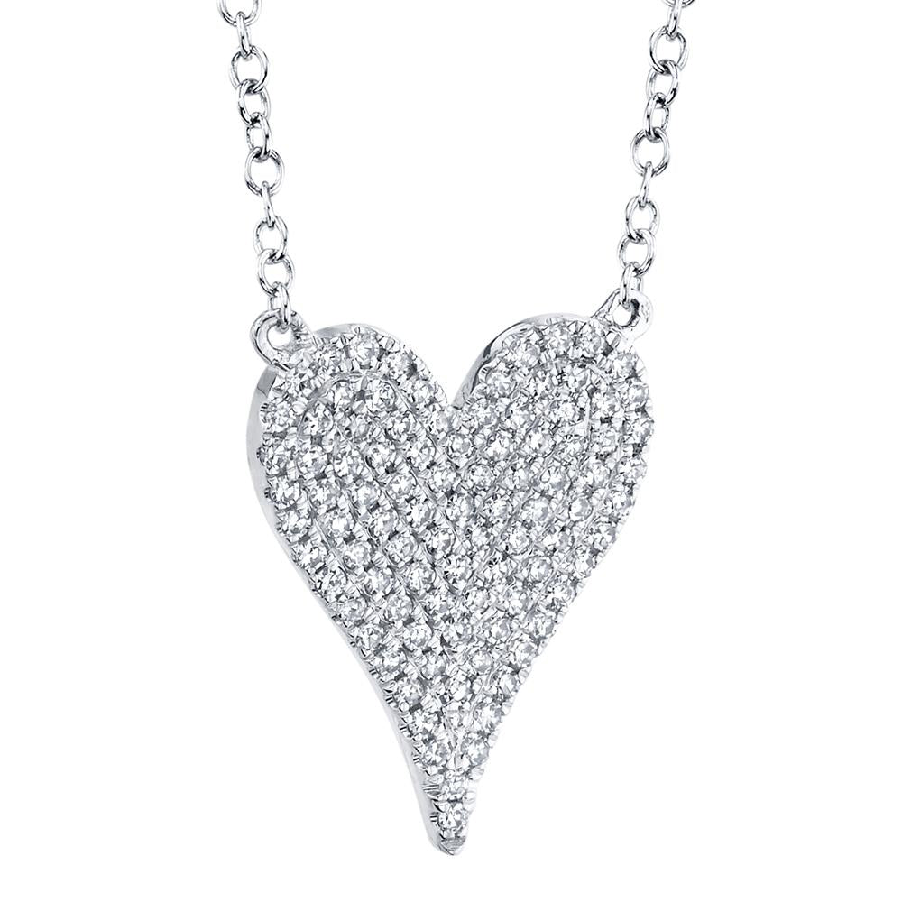 Heart-shaped diamond pendant necklace.