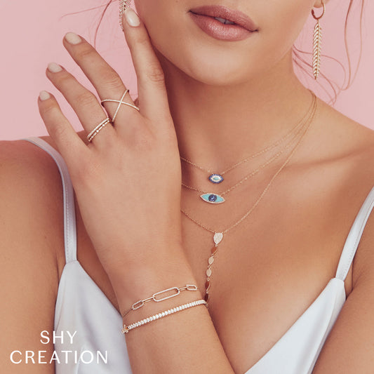 Evil Eye necklace with sapphire centerpiece.
