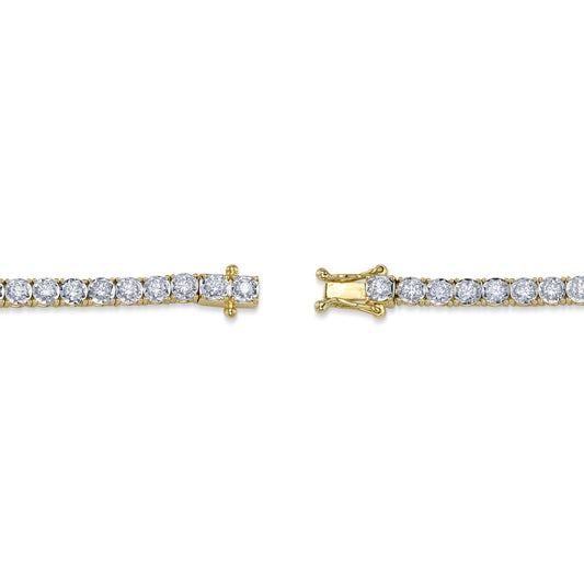 Yellow gold bracelet with round diamonds.