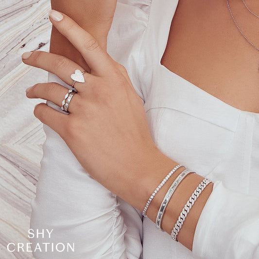 14K white gold ring with round diamonds.