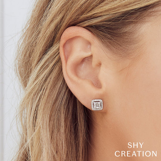 Square diamond stud earrings in white gold.