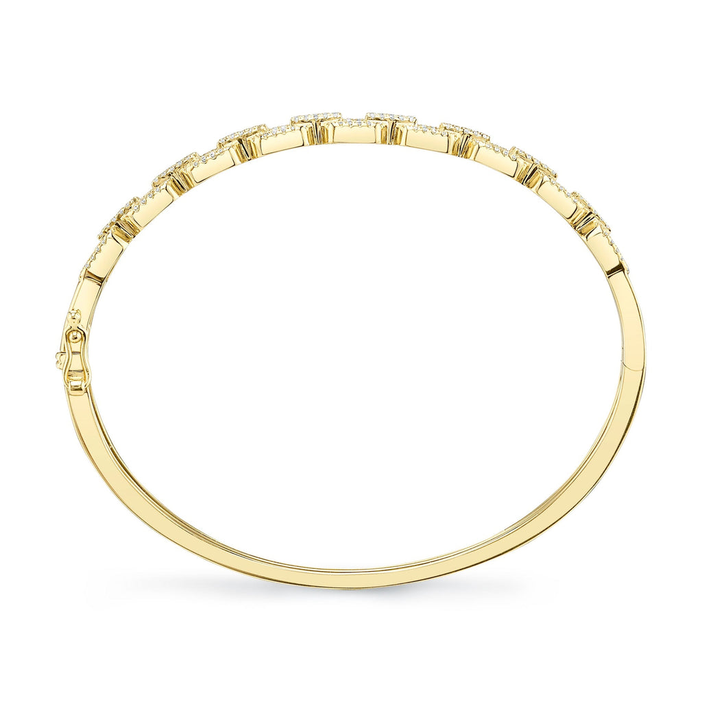 Yellow gold bracelet with round diamonds.