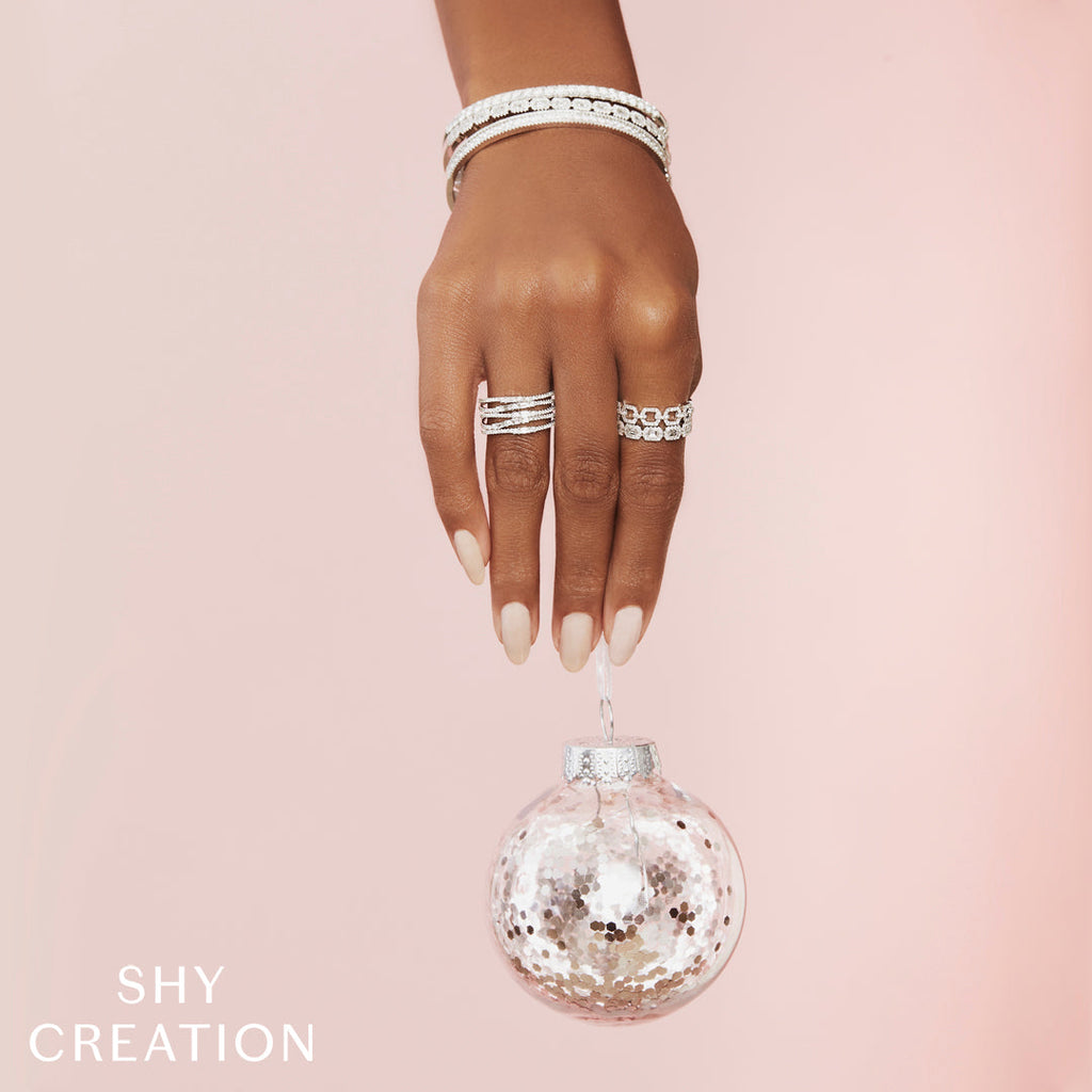 Diamond band with various shapes, white gold.