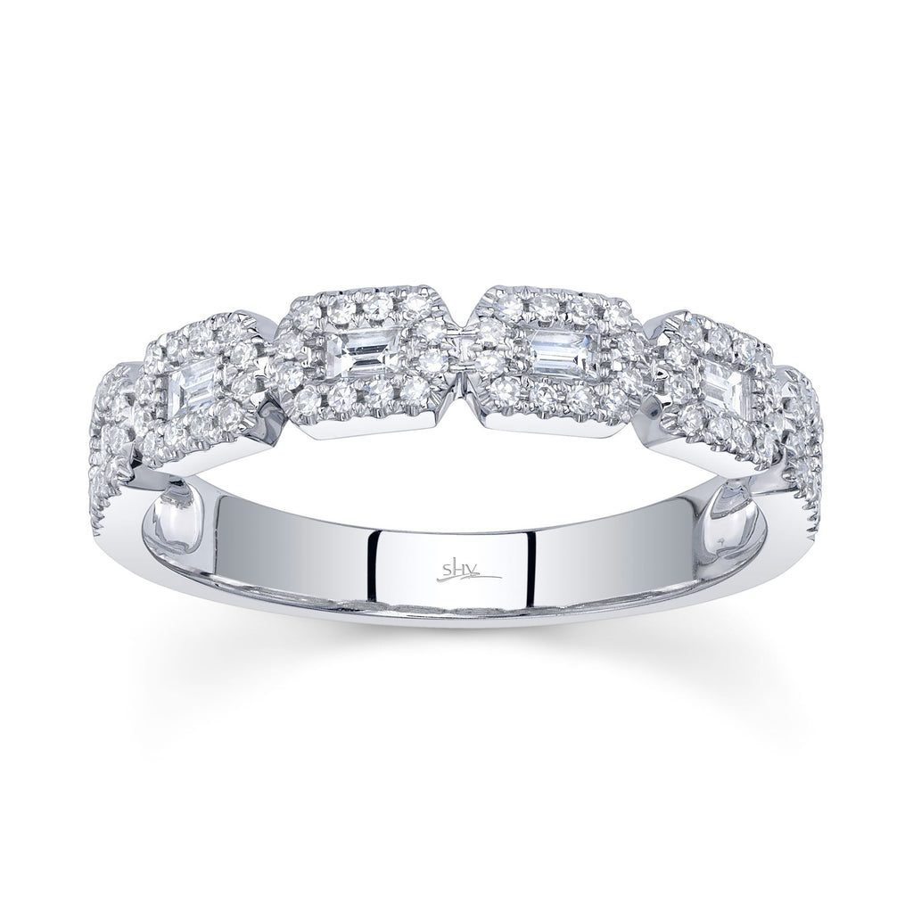 White gold band with geometric diamond shapes.