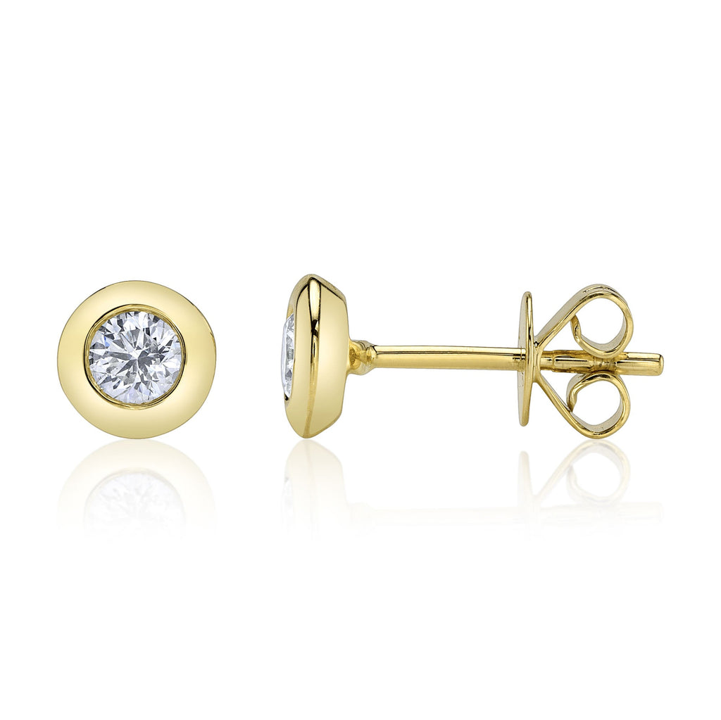 14K yellow gold diamond stud earrings.