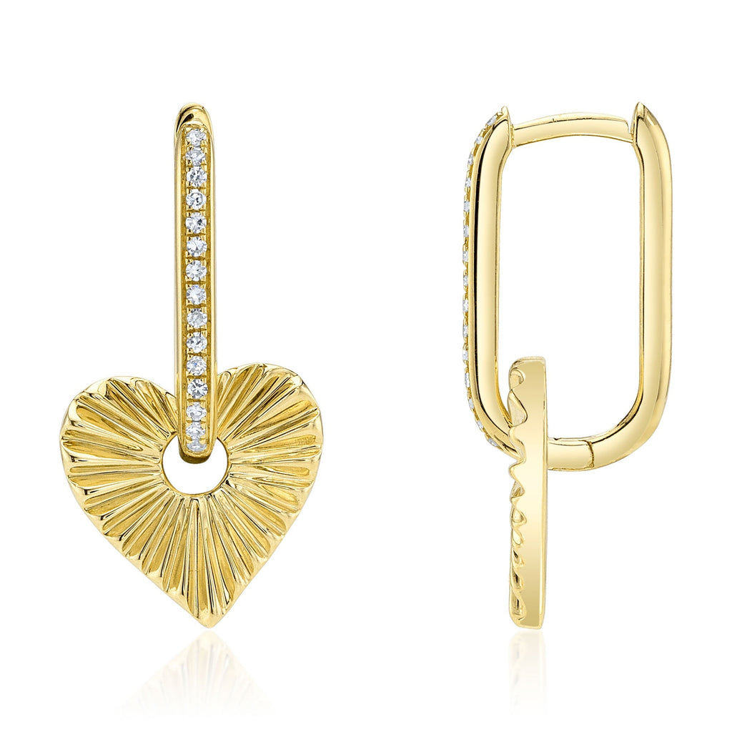Gold heart dangle earrings with diamonds.