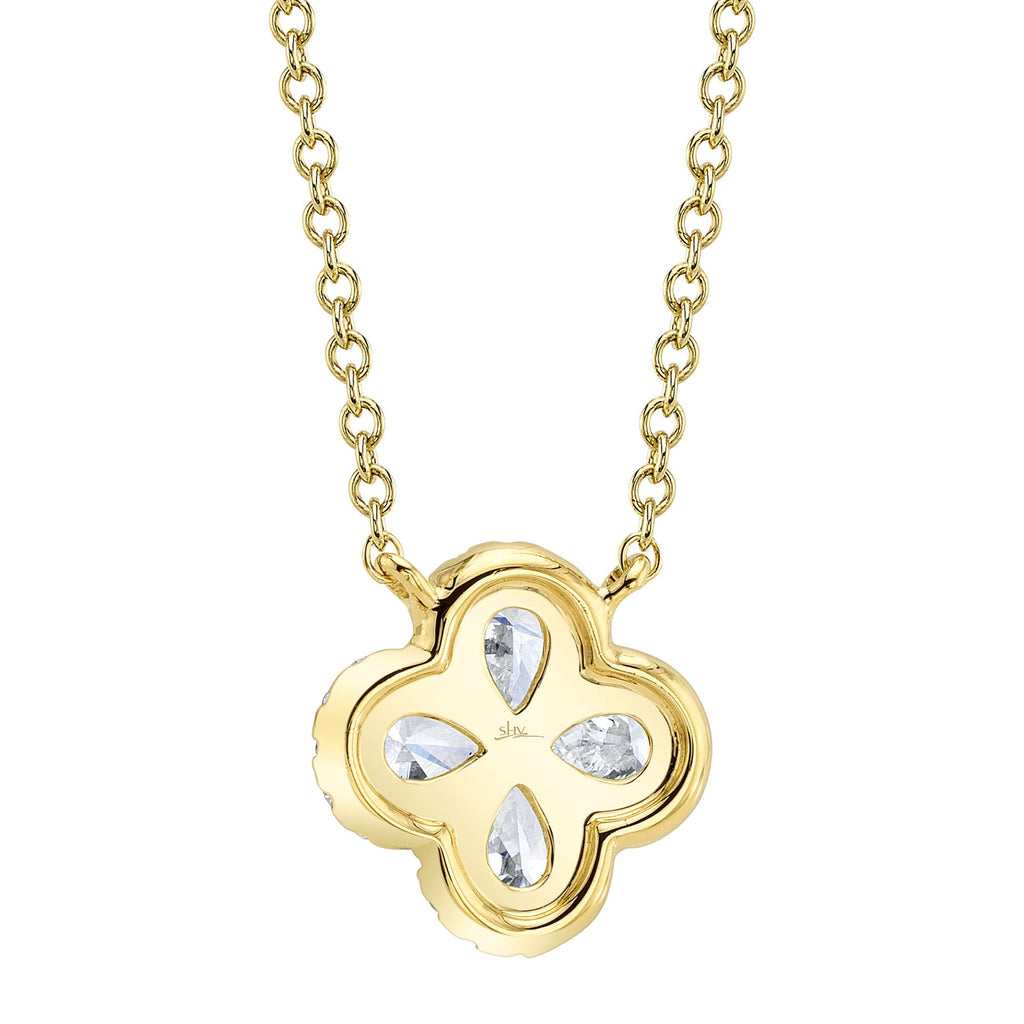 Clover-shaped yellow gold necklace with diamonds.