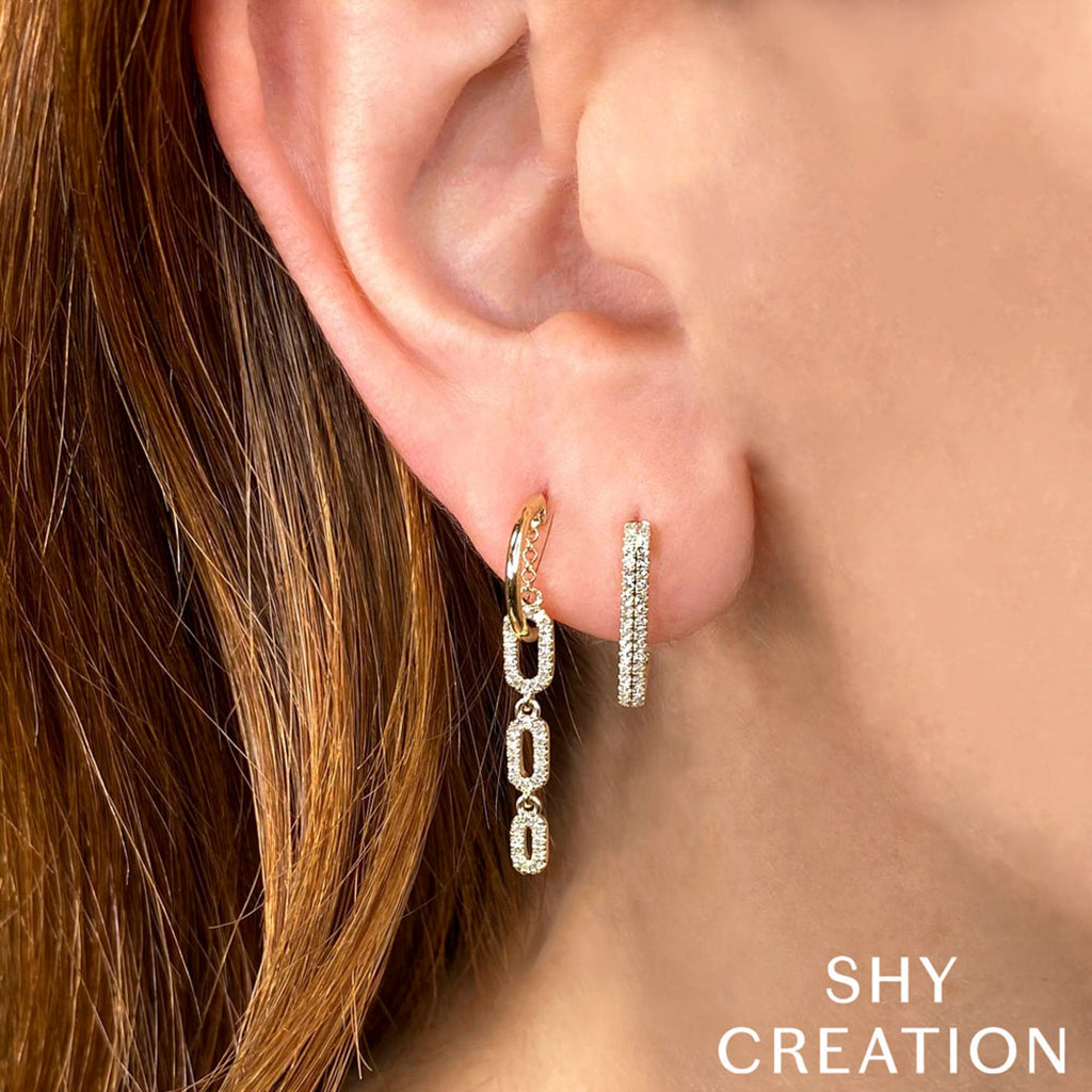 Square hoop diamond earrings in white gold.