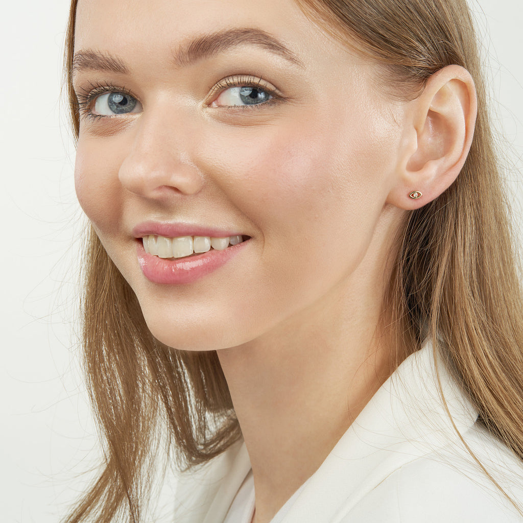 14K yellow gold diamond stud earrings.