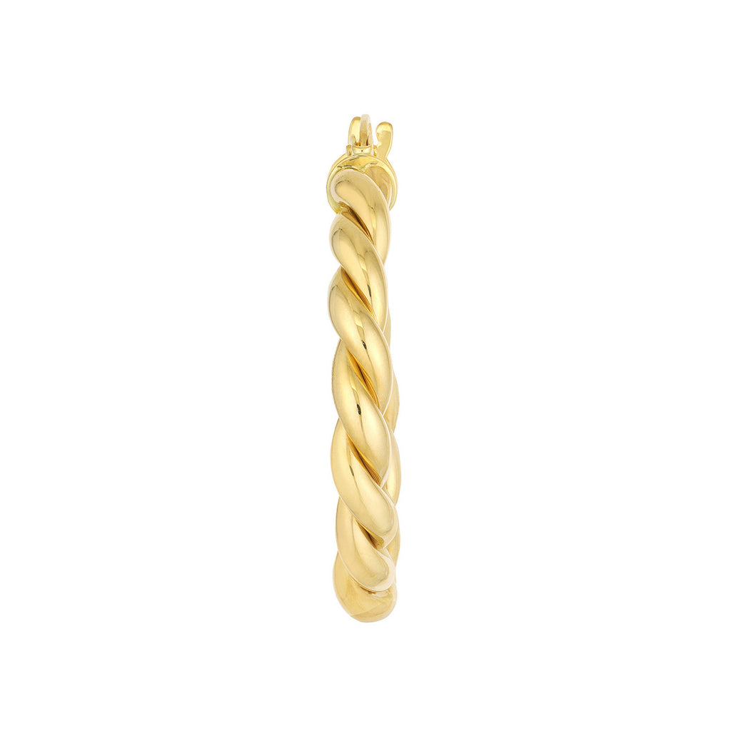 Twisted 14K yellow gold hoop earring.