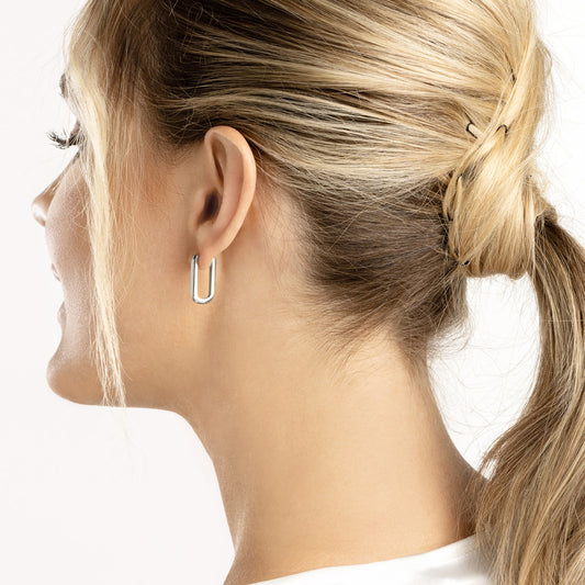 14K white gold small hoop earrings.