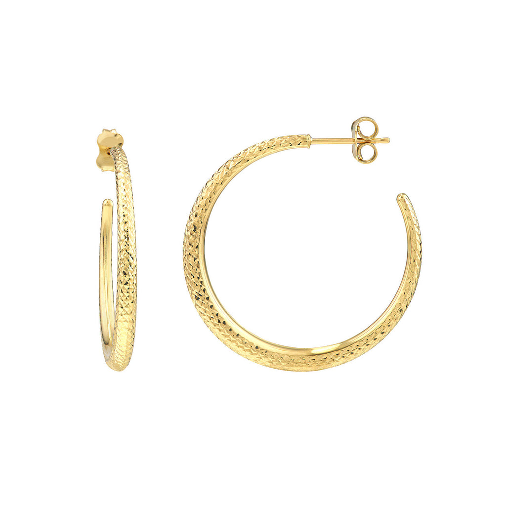 Diamond-cut 14K yellow gold medium hoop earrings.