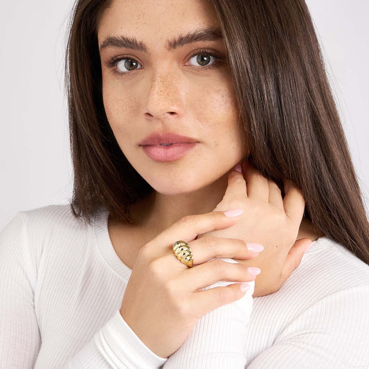 14K yellow gold textured band ring.