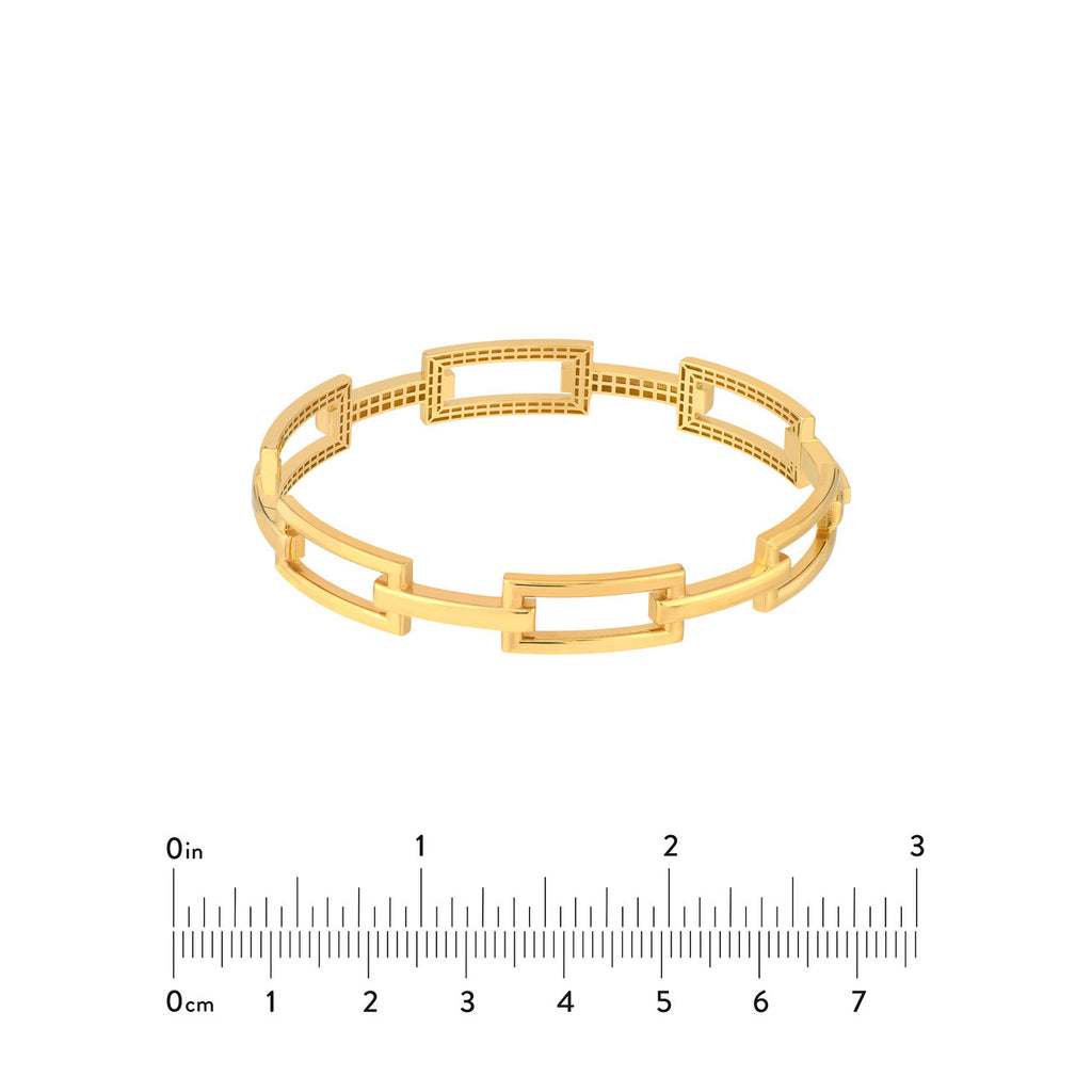 Geometric 14K yellow gold bangle bracelet.