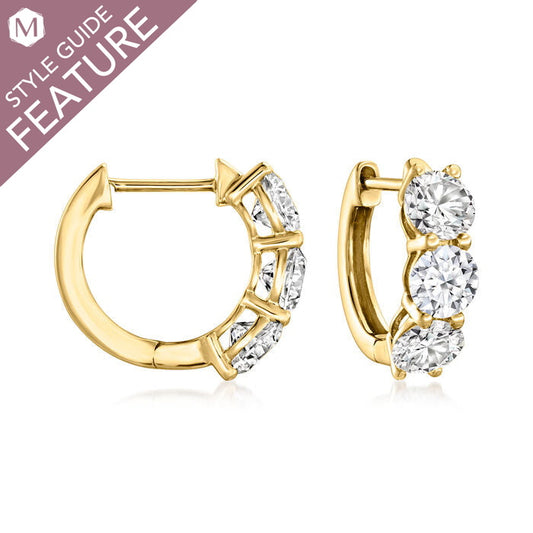 14K gold huggie earrings with round diamonds.