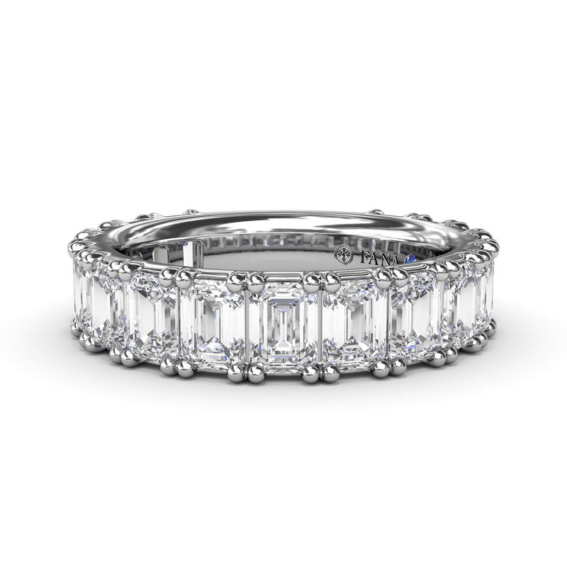 14K white gold band with emerald diamonds.