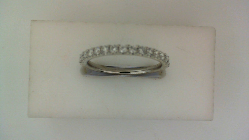 White gold band with round lab-grown diamonds.