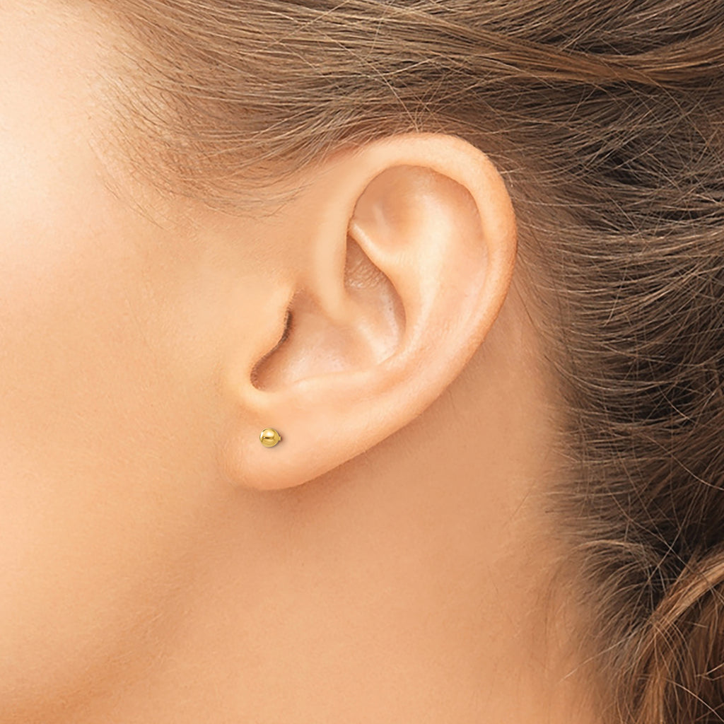 14K Yellow Gold Stud Earrings on Ear