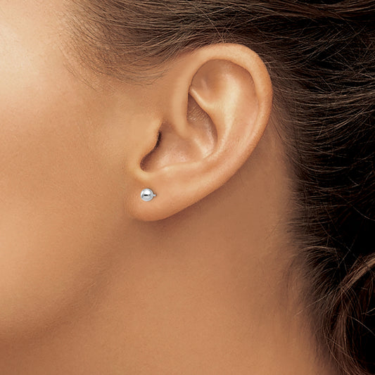14K white gold minimalist stud earrings.
