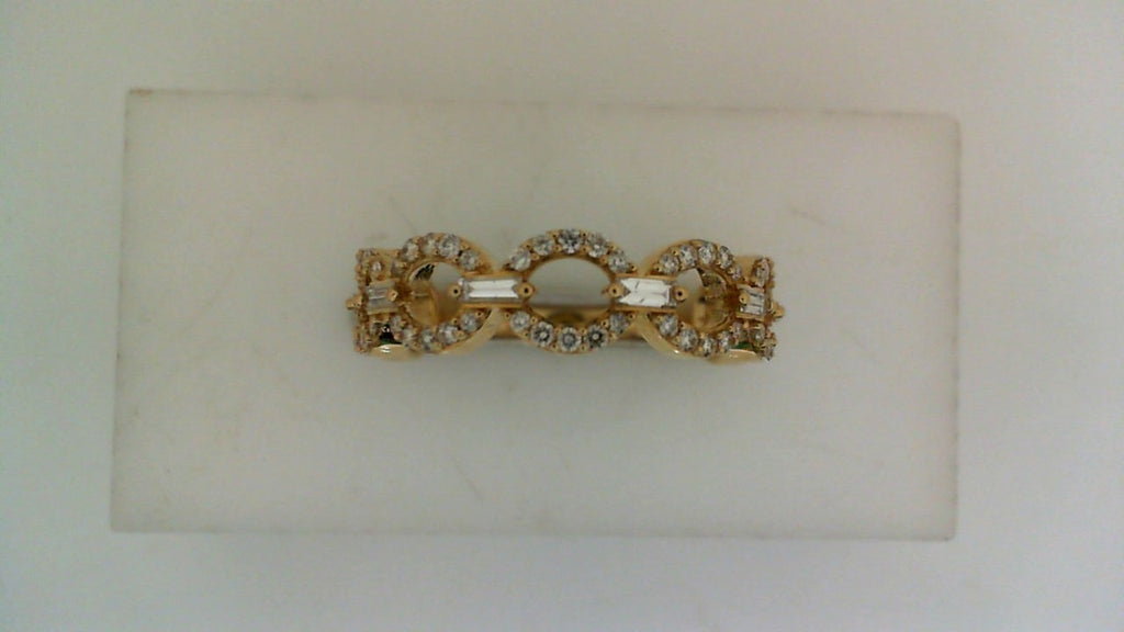 Front view of a yellow gold bracelet featuring diamond-set circular links connected by baguette-cut diamond accents.